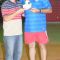 Representante do Tijucas Clube recebe troféu de participação